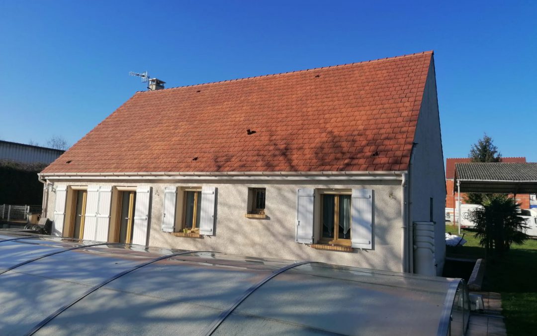 Maison avec des combles aménagés côté